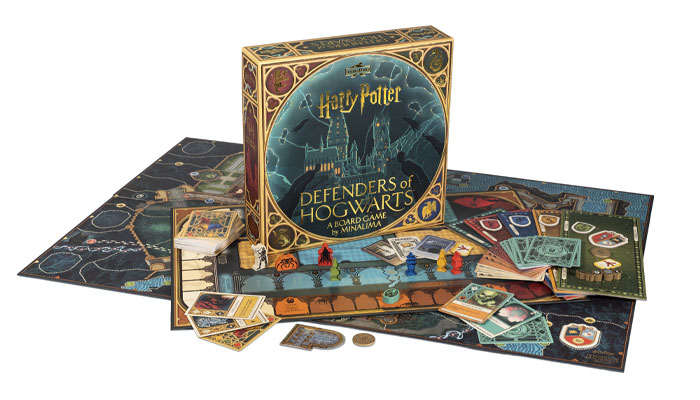 Official MinaLima product image showing the Defenders of Hogwarts box, board, cards, and components.