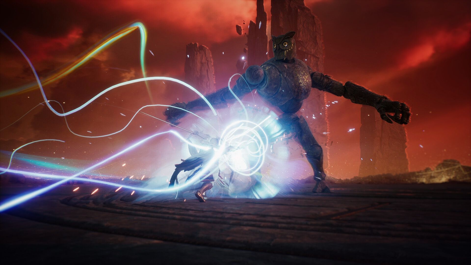 A large owl-faced construct faces a small character and a bright attack effect beneath a red sky.