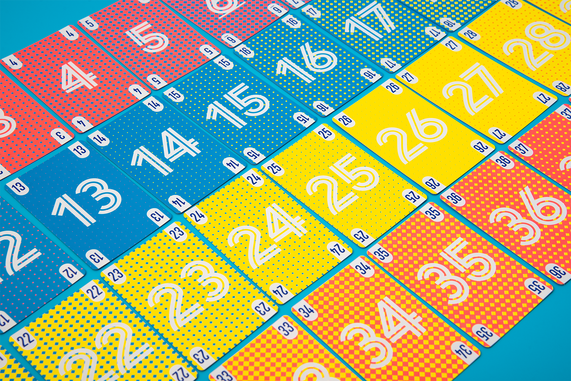 Official Loop 40 photograph showing rows of bright numbered cards with distinct geometric patterns.
