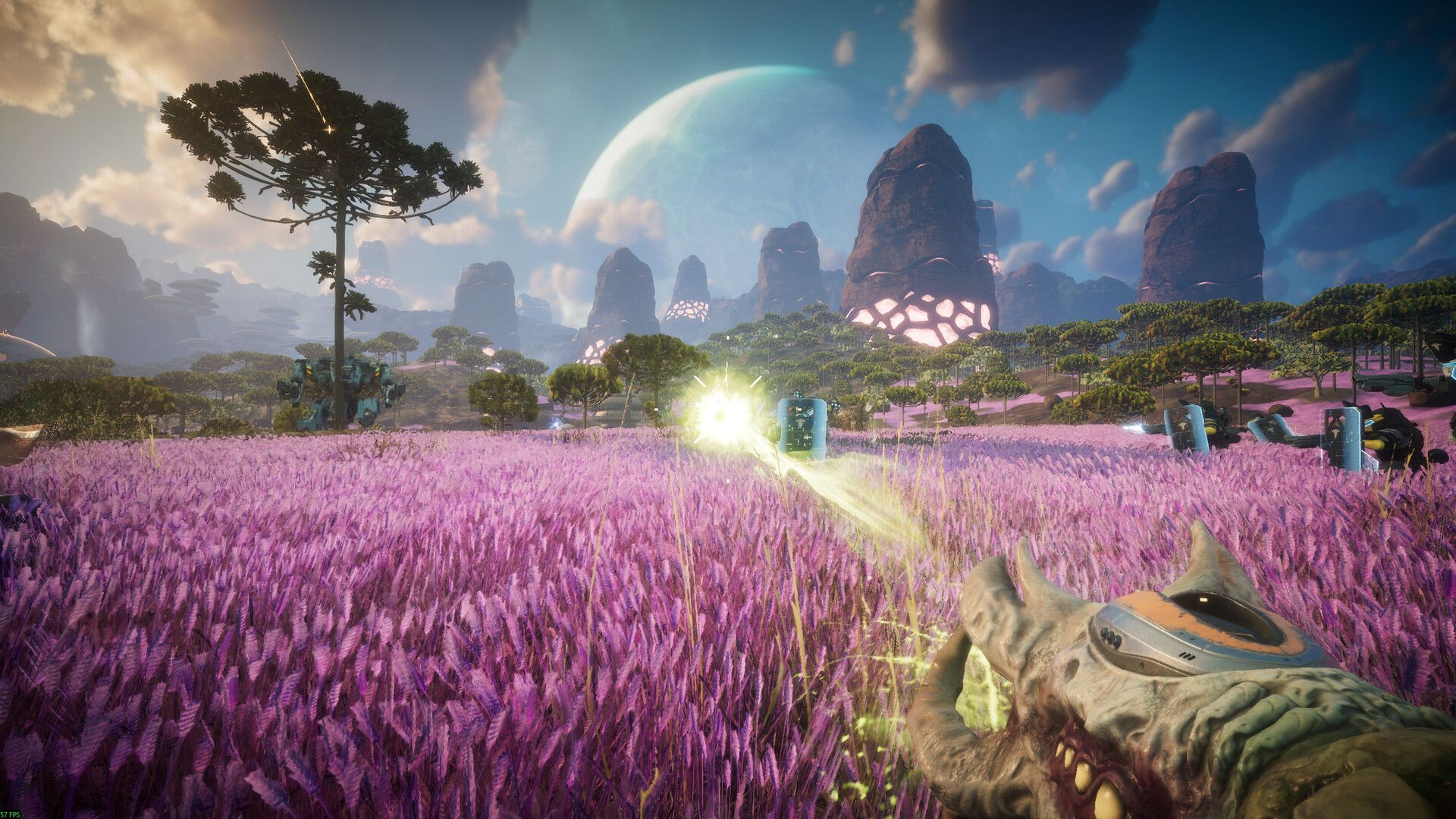 Official Pax Autocratica first-person screenshot showing a firefight across a purple field with a bio-organic weapon in the foreground and mechs in the distance.