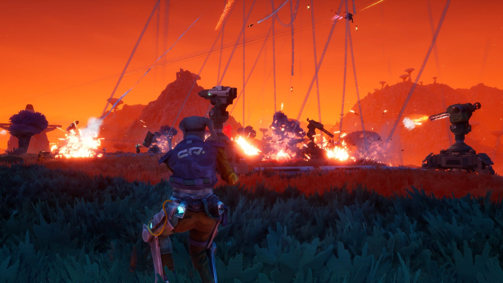 Official Gravhounds screenshot showing a chaotic firefight with multiple canine workers and alien enemies.