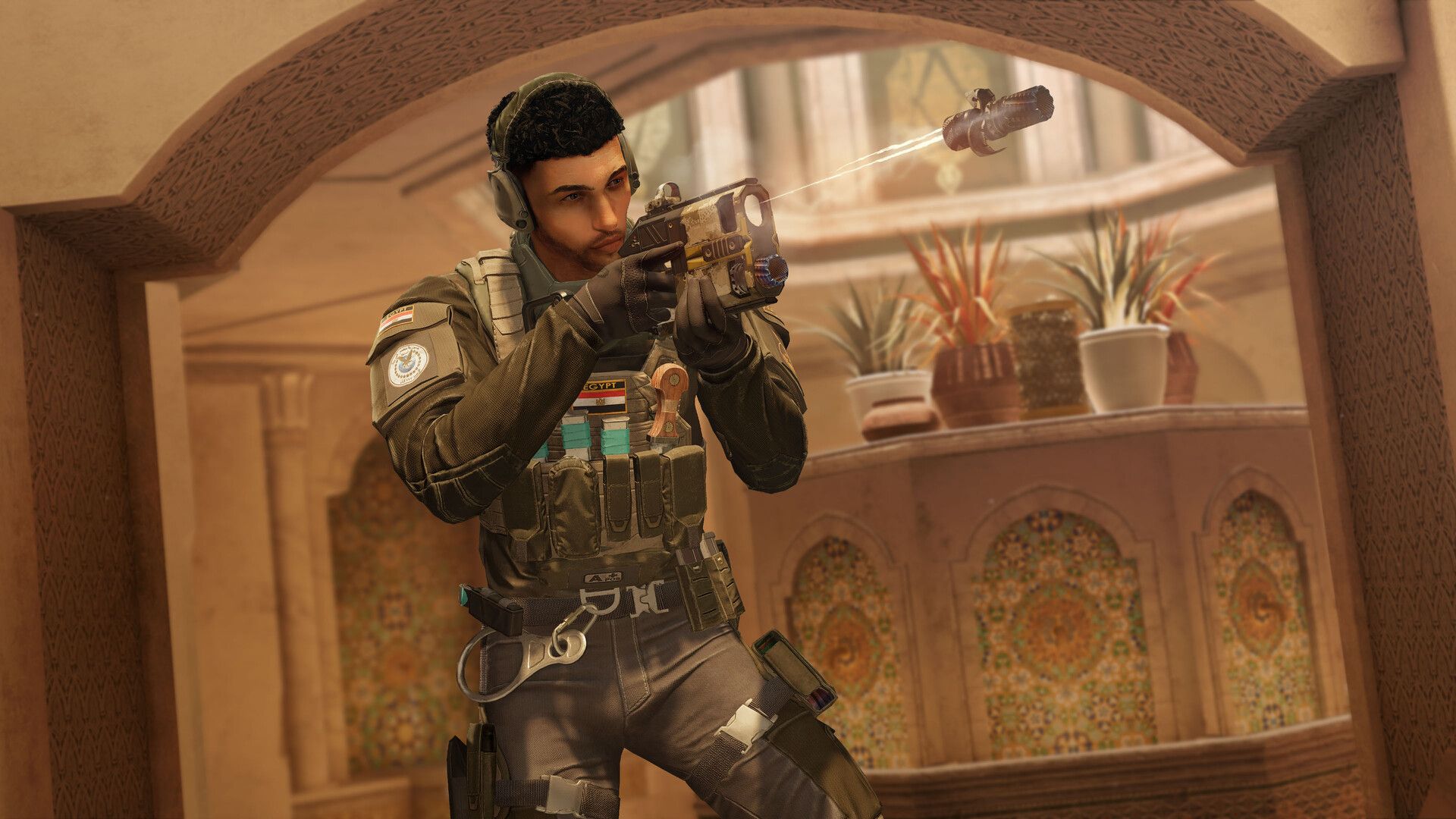 Official Rainbow Six Siege screenshot from Steam showing operators breaching and trading fire inside a building.