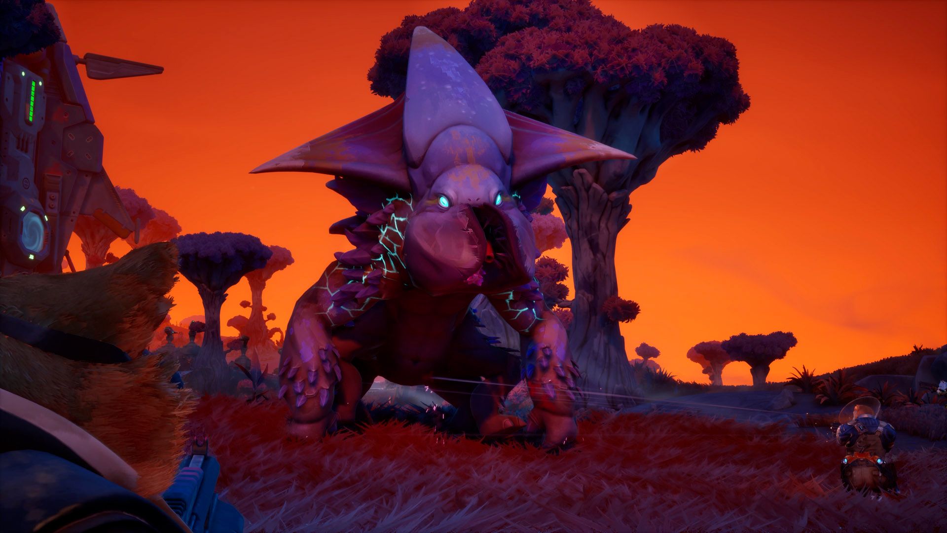 Official Gravhounds screenshot showing a large alien creature attacking the team near industrial equipment.