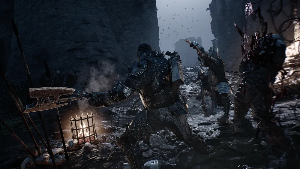 Official Mortal Shell II screenshot showing an armored fighter swinging a large axe at enemies in a narrow stone passage.