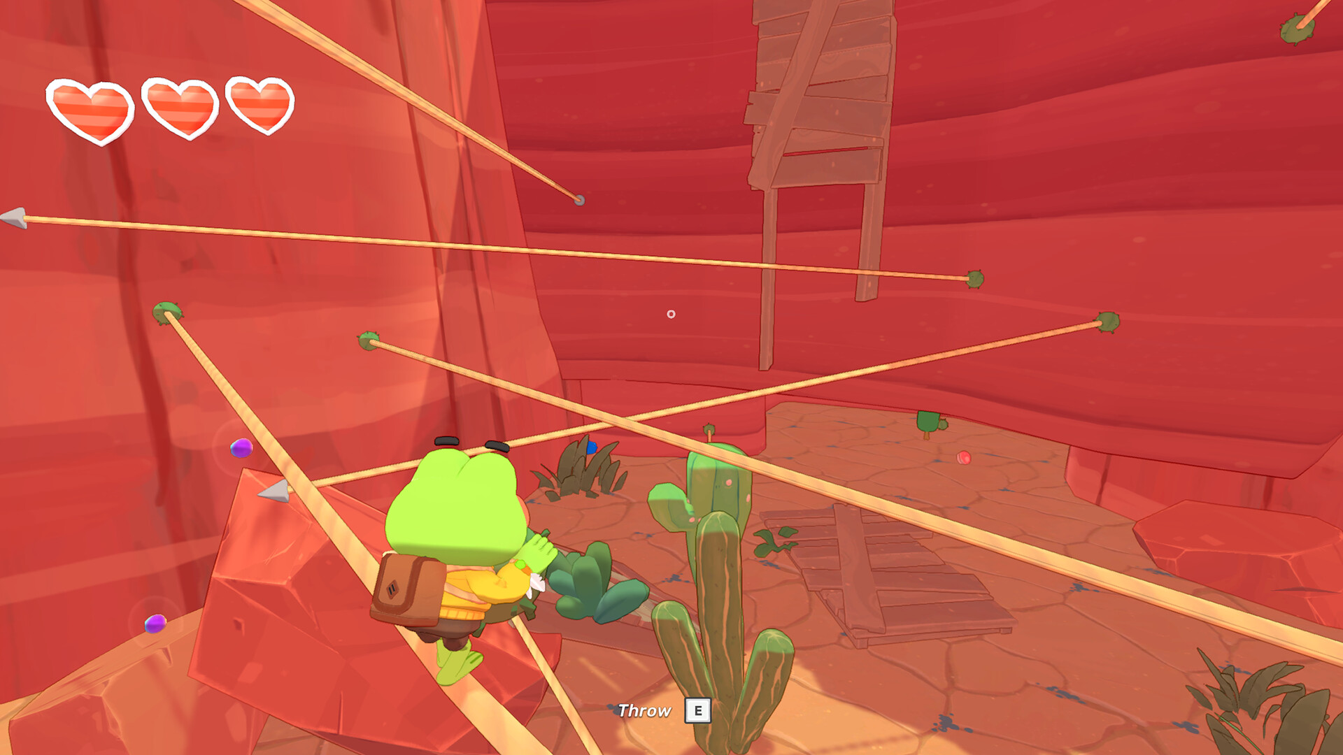 Official Big Hops screenshot showing Hop moving through a red canyon crossed by multiple cactus tightropes.