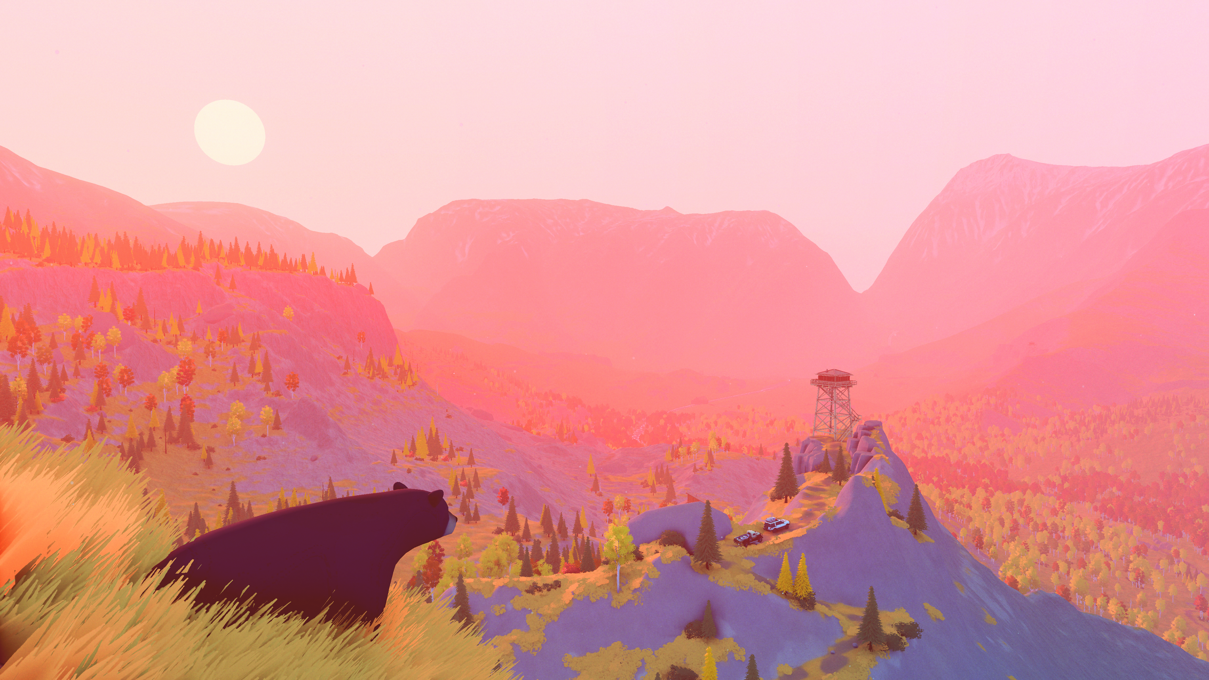 A bear stands in the foreground above two vehicles near a lookout tower in a pink sunset valley.