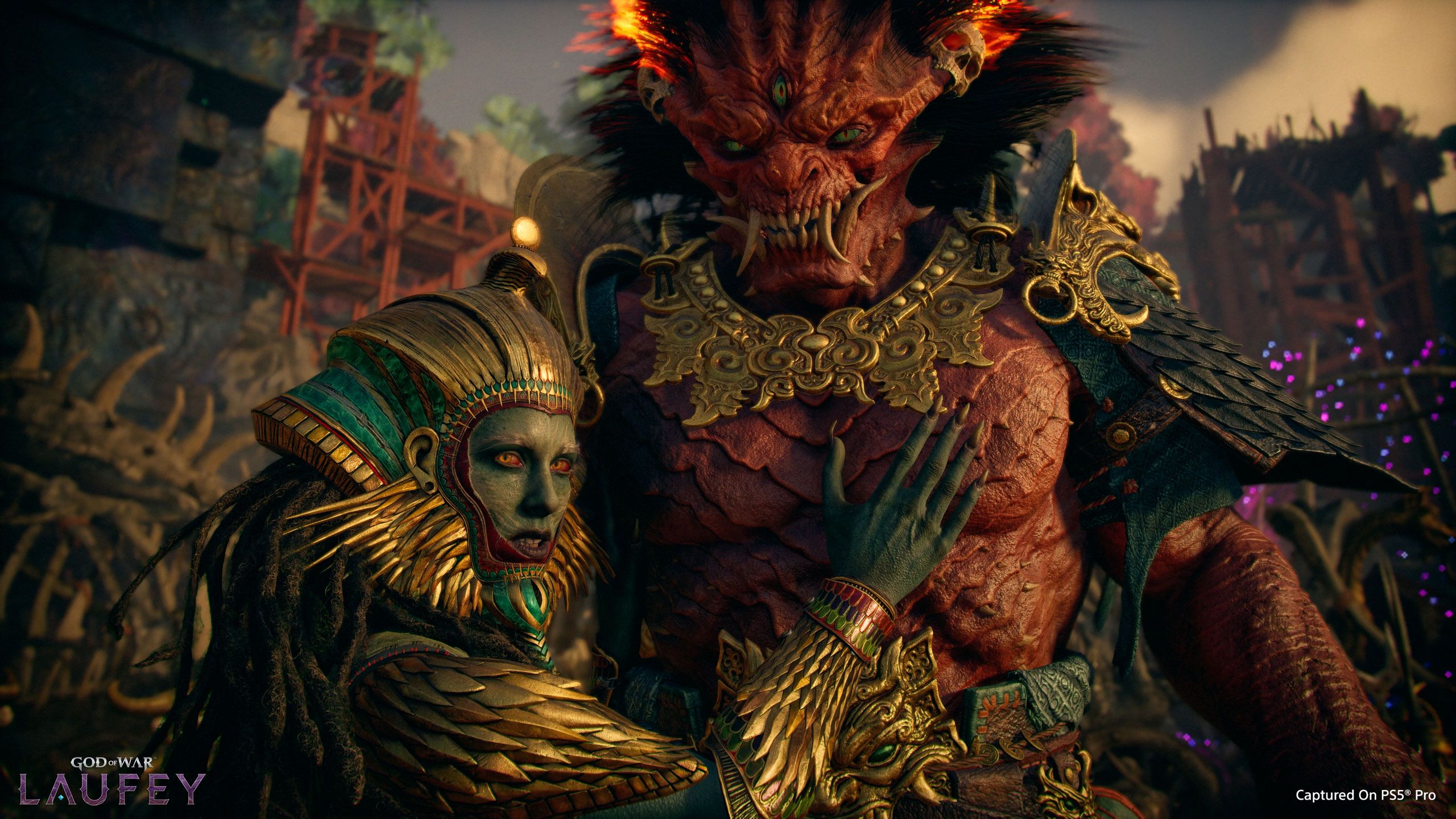 Official God of War: Laufey screenshot showing two monstrous enemies in ornate armor.