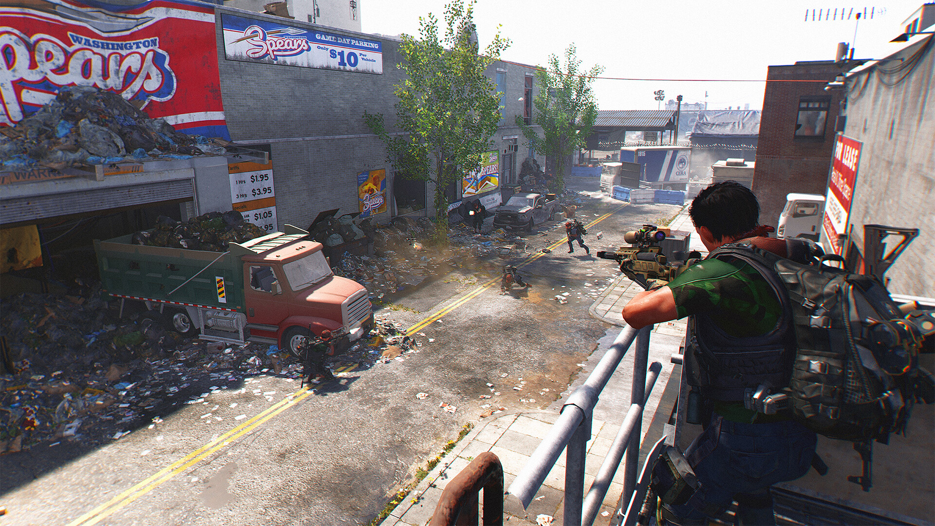 Official The Division 2 Steam screenshot showing agents fighting in a ruined city environment.